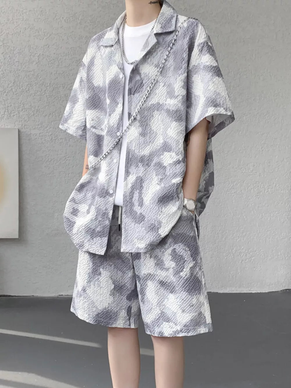 Men's casual camouflage shirt and shorts set in dark gray, featuring a relaxed fit and short sleeves.