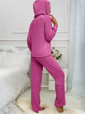 Ribbed knit lounge set in Hot Pink with a hooded top and long pants.