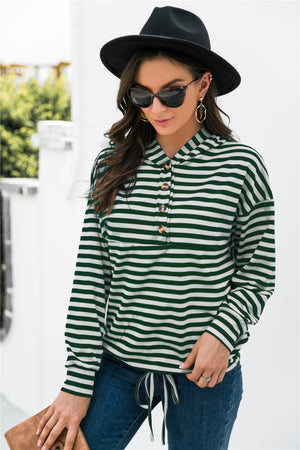 Forest green and white striped relaxed fit hoodie with button neck detail.
