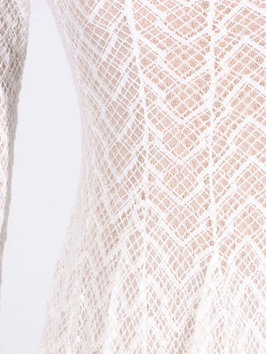 White lace maxi dress with chevron pattern and mock neck detail