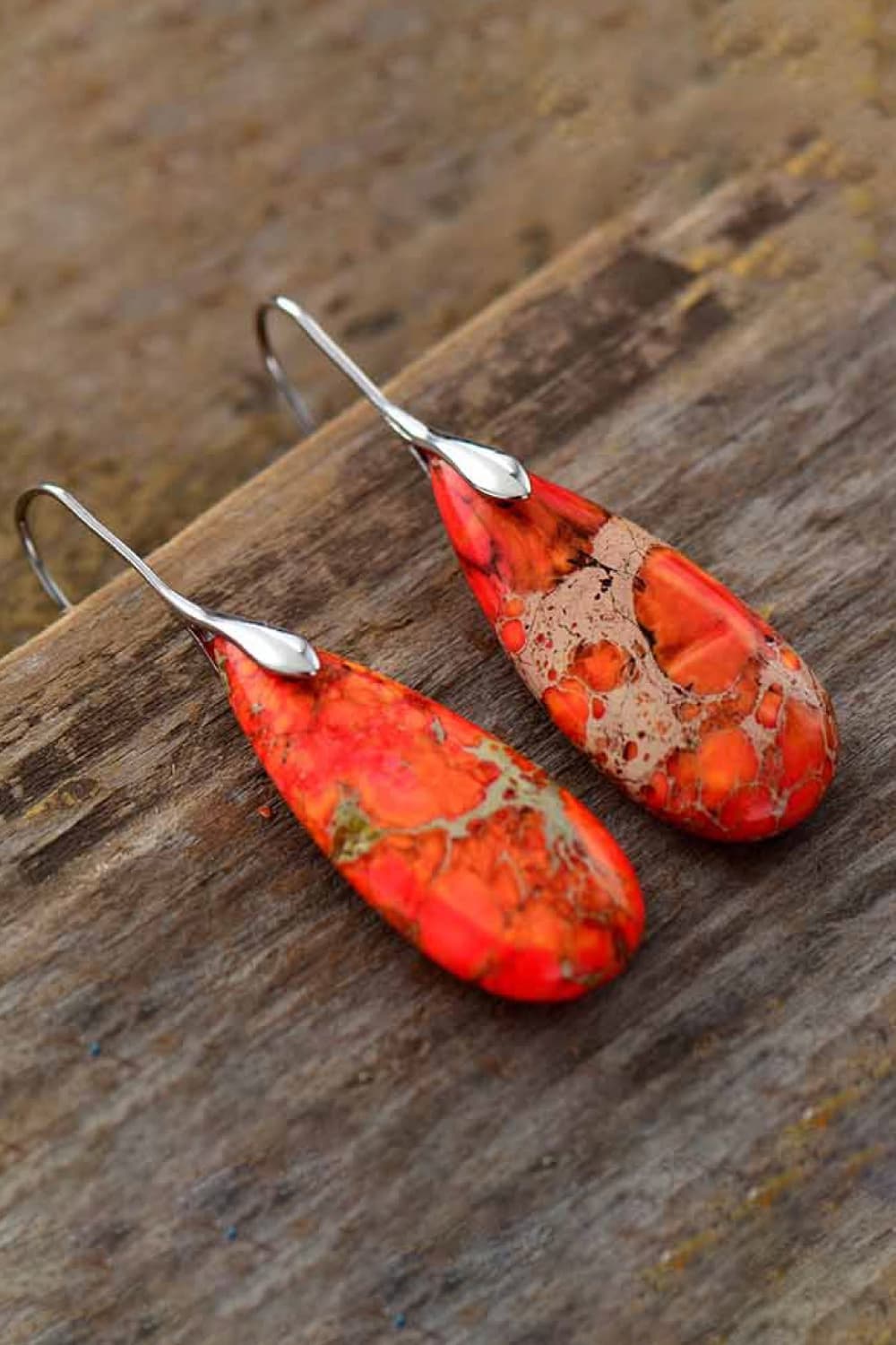 Ocean Jasper dangle earrings in orange with silver hooks.