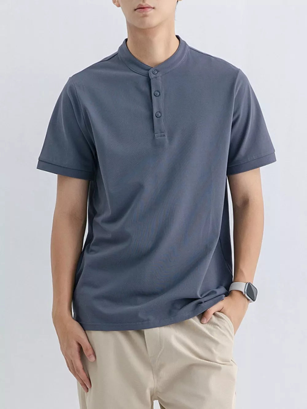 Men's short sleeve t-shirt in Blue Gray, cotton blend, with band collar and button placket.