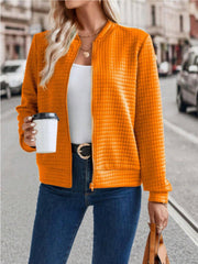 Quilted bomber jacket in Tangerine with zip closure and ribbed cuffs.