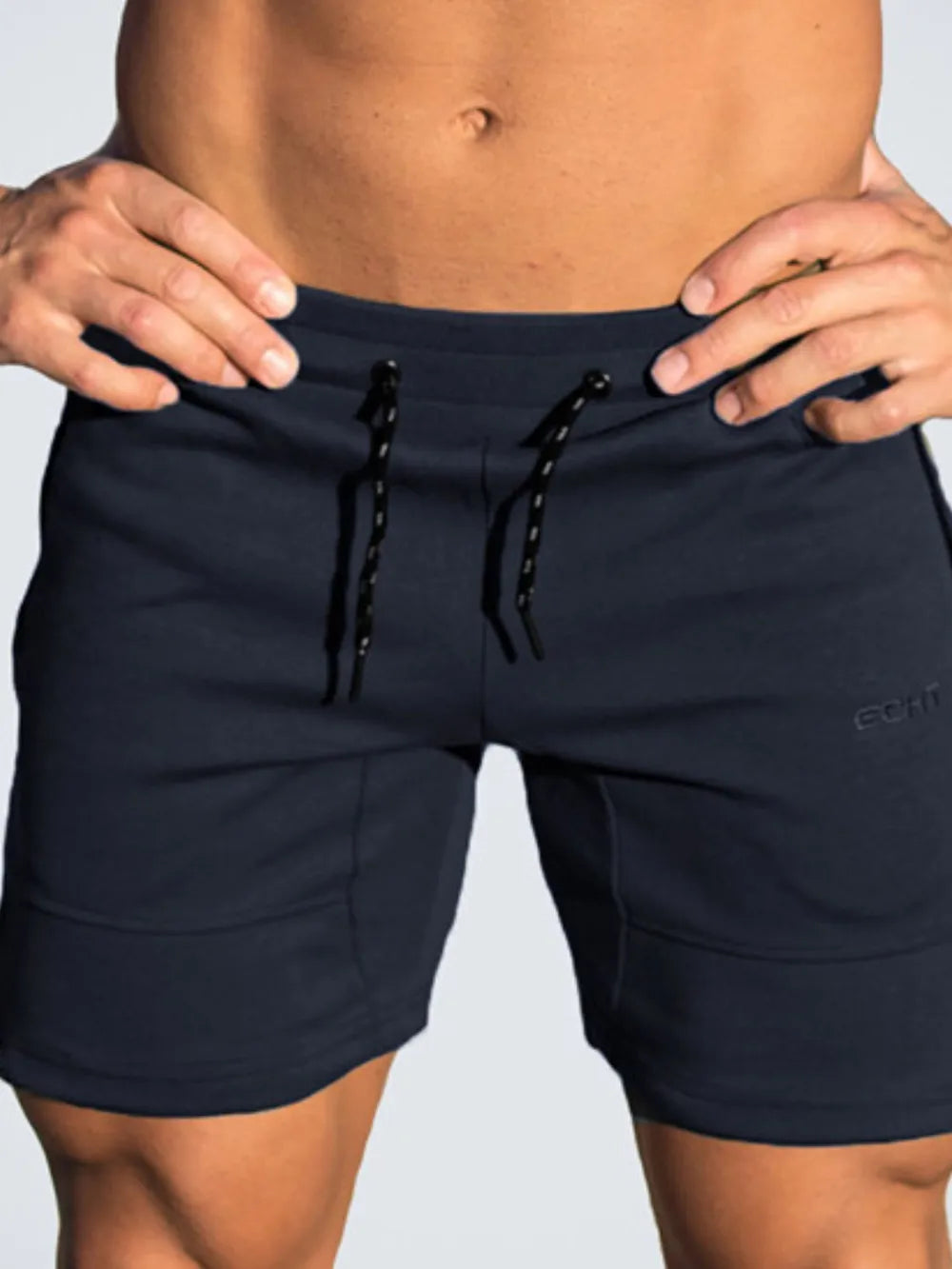 Navy training shorts with drawstring and embroidered logo detail