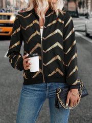 Black bomber jacket with gold chevron sequin pattern and zip front.