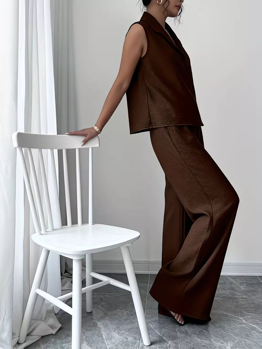 Chocolate sleeveless collared top and wide-leg pants set with textured fabric.