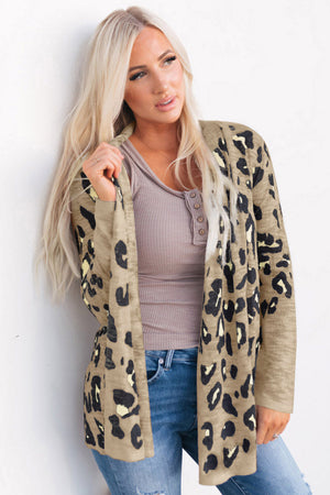 Tan leopard print open-front knit cardigan with long sleeves.