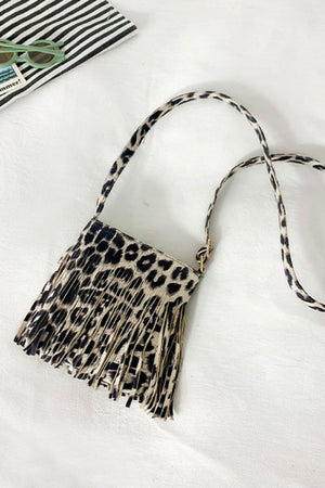 Leopard print crossbody bag with fringe detail and adjustable strap
