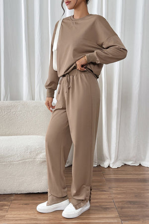 Camel relaxed fit loungewear set with drawstring waist pants and crewneck sweatshirt.
