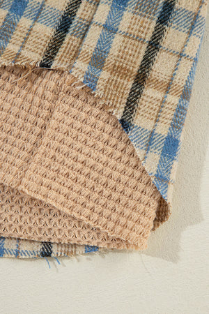 Textured plaid hooded overshirt with raw hem and waffle knit lining.