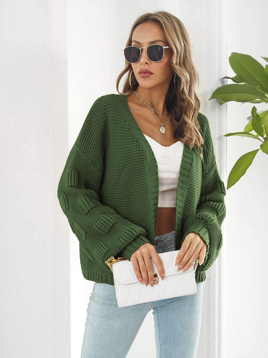 Army green knit cardigan with textured sleeves and open front.