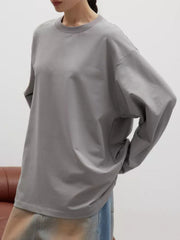 Light Gray oversized crewneck sweatshirt with voluminous sleeves and crew neckline.