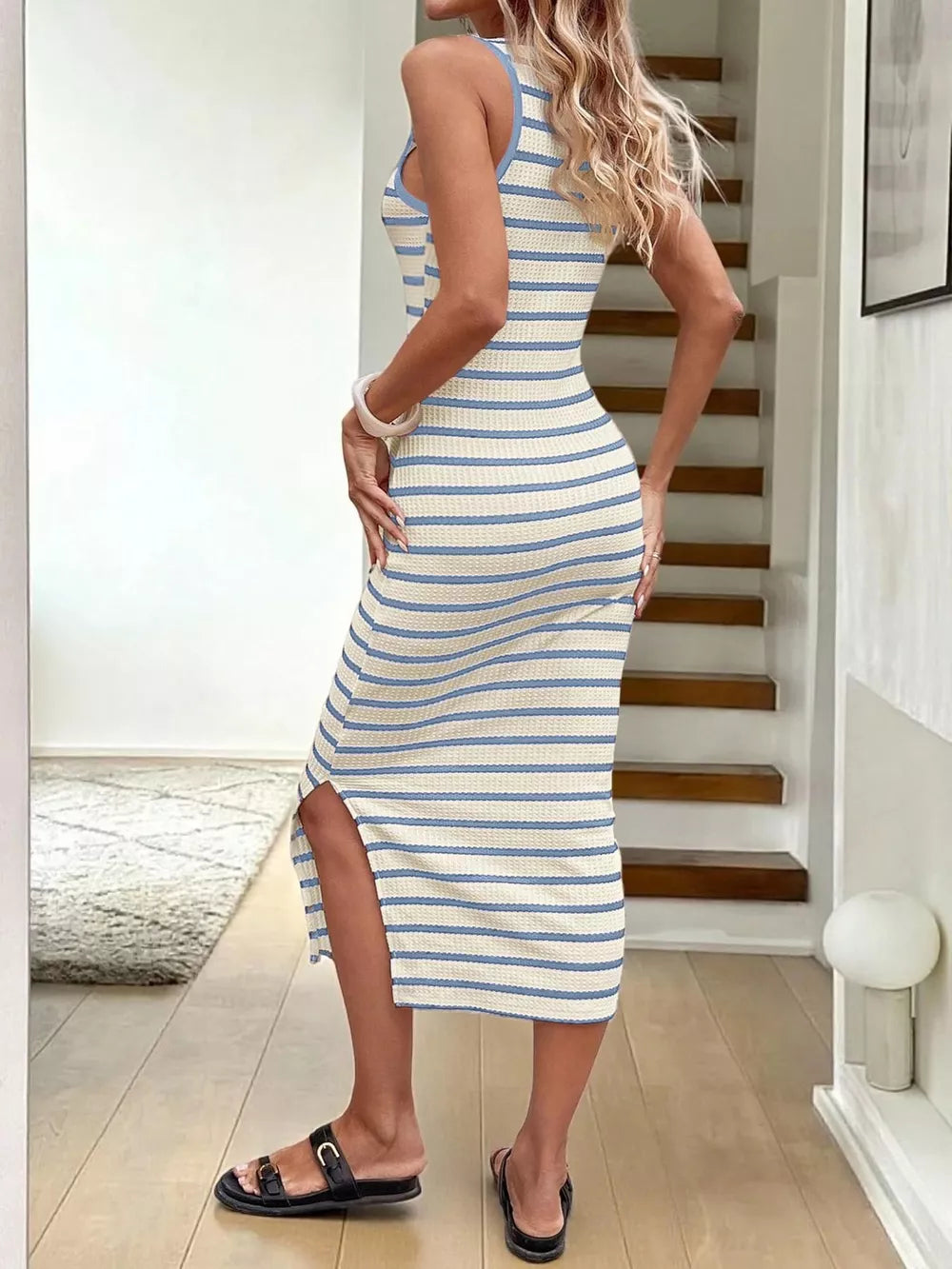 Bodycon midi dress in blue and white stripes with side slit and scoop neck.