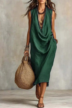 Dark green cowl neck midi dress with pockets and a relaxed fit.
