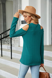 Teal textured knit cold-shoulder top with long sleeves.