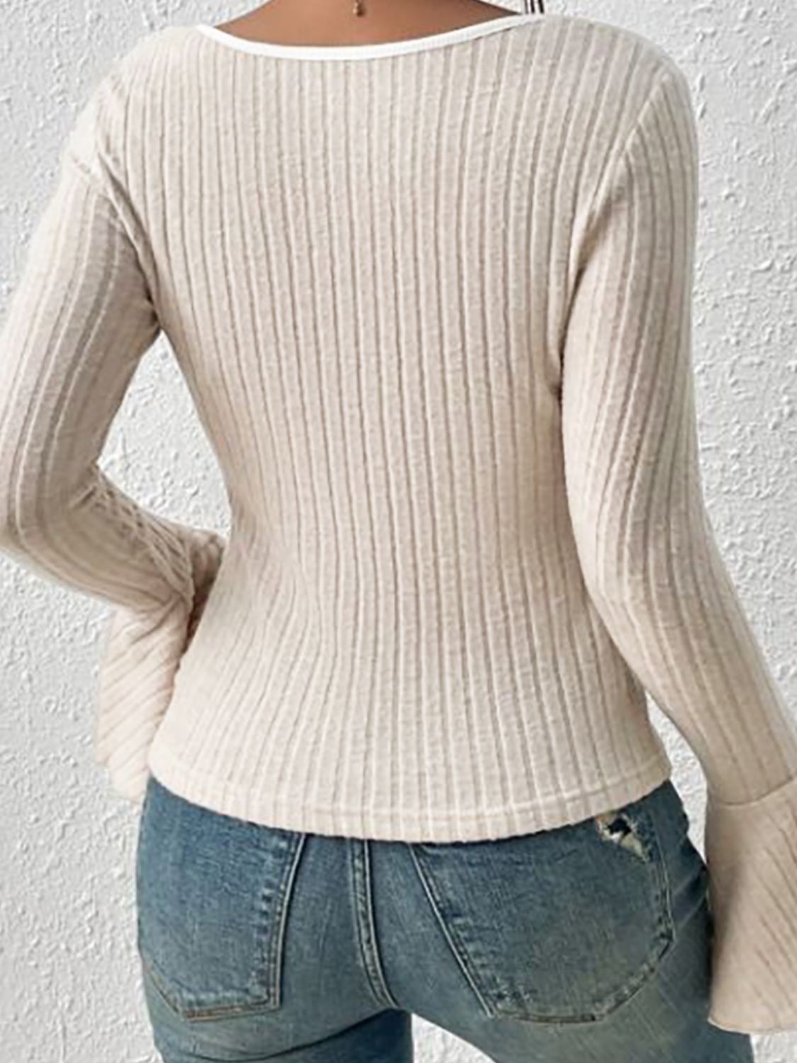 Dust Storm ribbed flare sleeve top with contrast trim neckline.