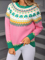 Pink knit sweater with charming clover and geometric pattern, crew neck, long sleeves.