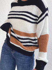 Casual striped knit sweater with color block accents in beige, black, and white acrylic.