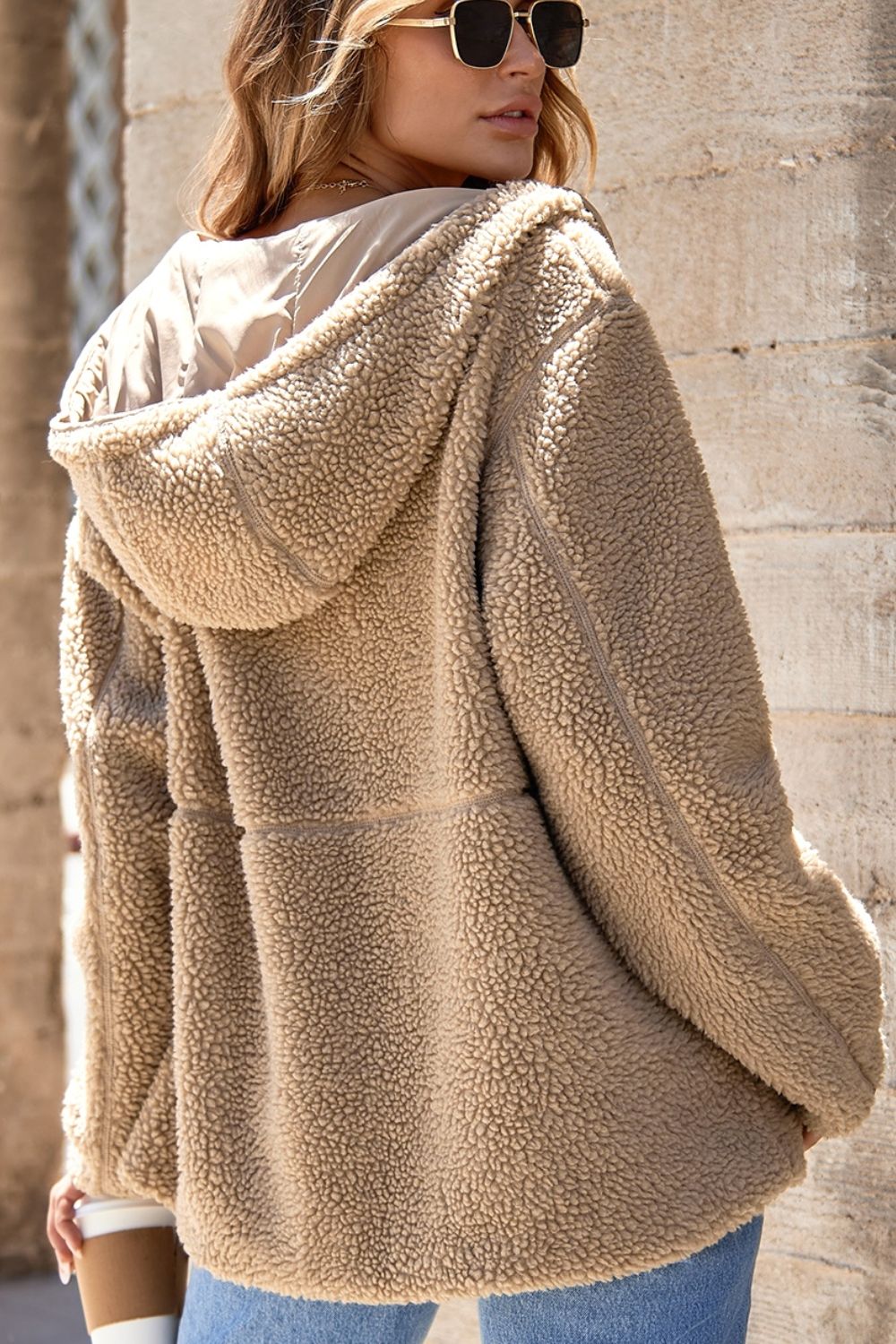 Sherpa lined hooded jacket in khaki with contrast lining and casual fit.