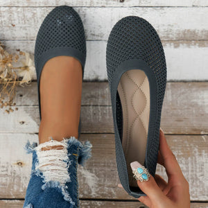 Dark Gray breathable knit ballet flats with a diamond-quilted insole and a perforated texture.