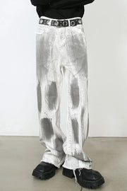 Brushstroke denim wide leg jeans in light with raw hem and artful grey abstract print.