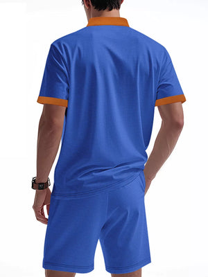 Men's sapphire blue two-piece set with orange trim on collar and sleeves.
