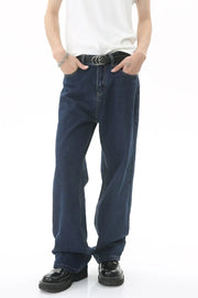 Baggy dark wash denim jeans with a subtle flare and casual styling.