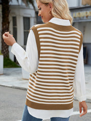 Camel and white striped knit vest with V-neck and side slits, worn over a white shirt.