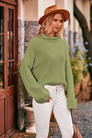 Matcha green acrylic turtleneck sweater with cuffed sleeves and a relaxed fit.