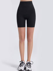 Black high-waist bike shorts with a V-shaped seam detail.