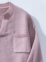 Dusty pink knit sweater with notched neckline and chest pocket.
