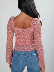 Pink floral lace blouse with square neckline and ruched sides.