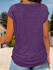 Violet cap-sleeve tee with ruched sides and a curved hem.