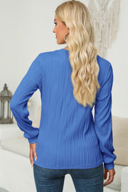 Textured wave crewneck pullover in Cerulean with long sleeves and a casual fit.