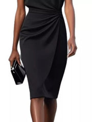 Black ruched sheath dress with keyhole neckline and tulip hem.