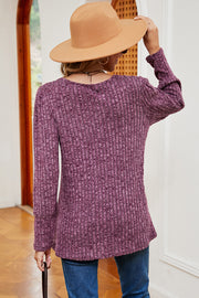 Asymmetric ribbed button-down top in Red-Violet with long sleeves and a crew neckline.