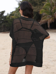 Black open-knit polo beach dress with short sleeves and a relaxed fit.
