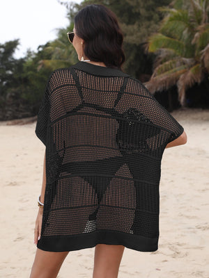Black open-knit polo beach dress with short sleeves and a relaxed fit.