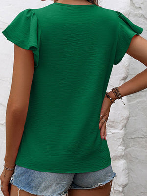 Dark Green textured blouse with flutter sleeves and gathered detail.
