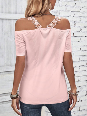 Dusty pink off-the-shoulder top with lace yoke detail and short sleeves.