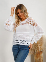 White openwork knit sweater with crew neck and balloon sleeves.