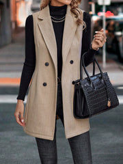 Khaki herringbone double-breasted tailored vest with a collared neckline and buttoned front.