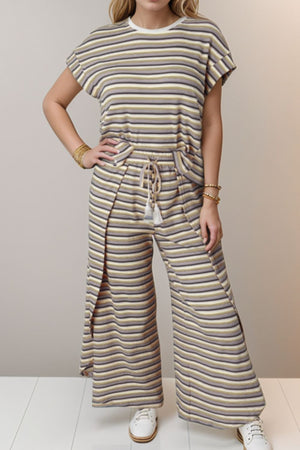 Cotton striped culotte jumpsuit with drawstring waist and side slits.