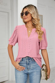 Pink perforated puff sleeve blouse with keyhole neckline and eyelet detail