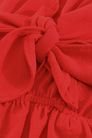 Scarlett playsuit with tie-front detail and elasticated waist.