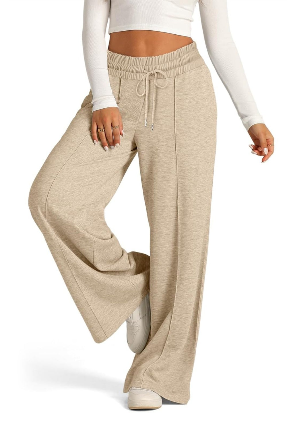 Seamed palazzo lounge trousers in tan with drawstring waist and wide leg.