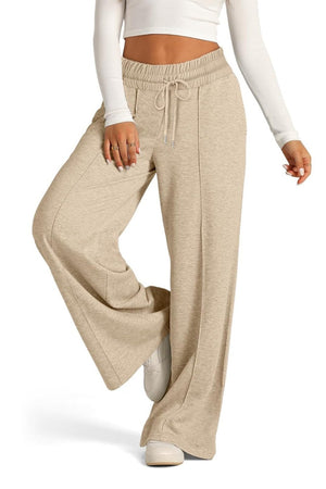 Seamed palazzo lounge trousers in tan with drawstring waist and wide leg.