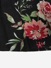 Black viscose maxi dress with a vibrant floral print and bell sleeves.