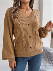 Khaki cable knit button-front cardigan with v-neck and balloon sleeves.