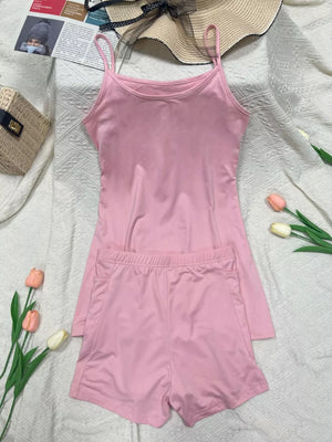 Pink scoop neck cami and pocketed shorts set.